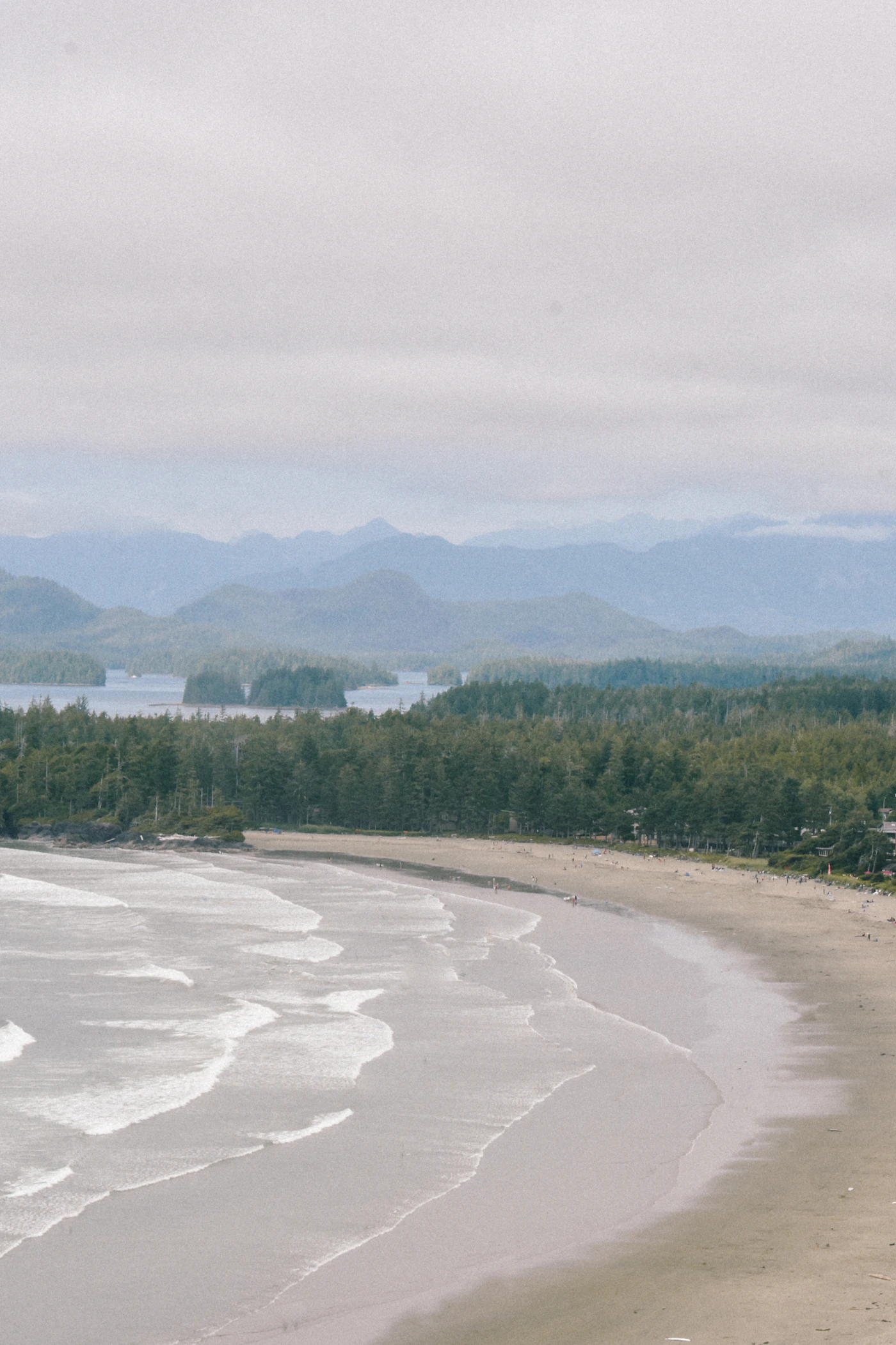 Island beach with mountains behind